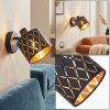 Alsen applique da parete orientabile con paralume nero-oro traforato E14