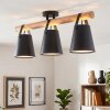 Plafoniera lineare Andian in stile Boho con barra in legno e 3 paralumi neri