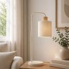 Brilliant lampada da tavolo Arlo in stile boho, con braccio arcuato e paralume beige